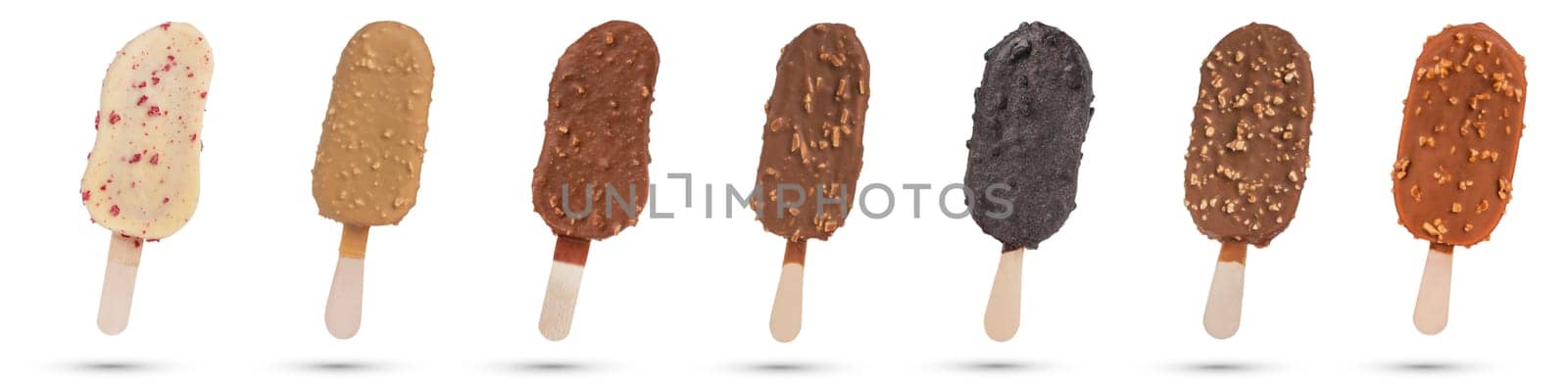 A set of ice cream with nuts of different varieties on a stick. Ice cream isolated on white background. A delicious delicacy for children and adults. by SERSOL