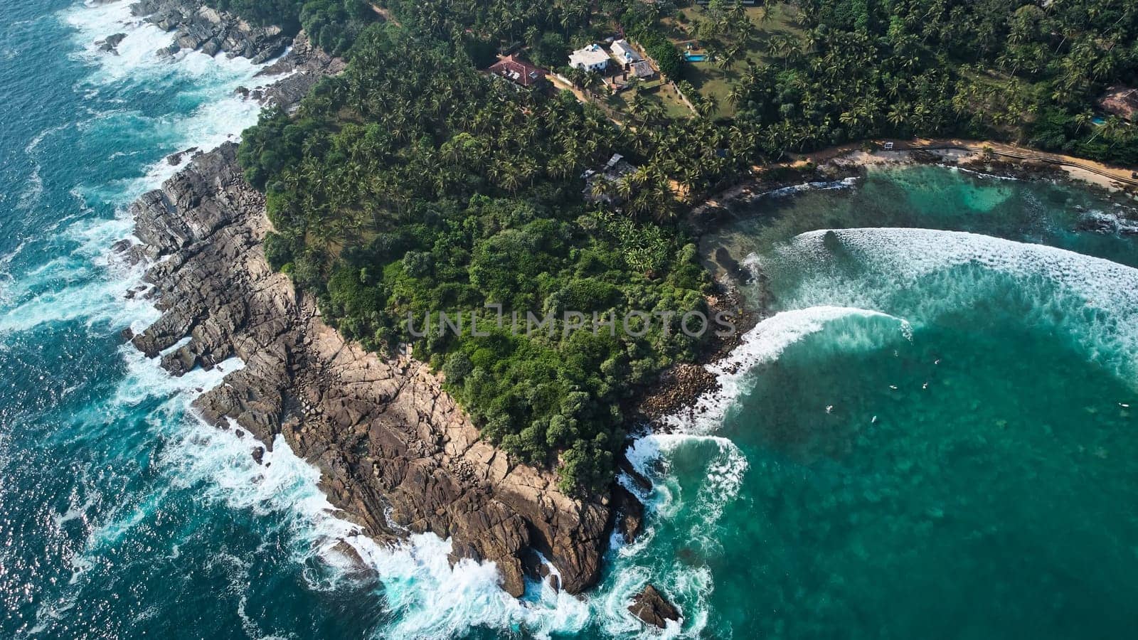 Aerial view of Hiriketiya Beach in Dikwella.Blue beach in Sri Lanka.Indian Ocean by driver-s