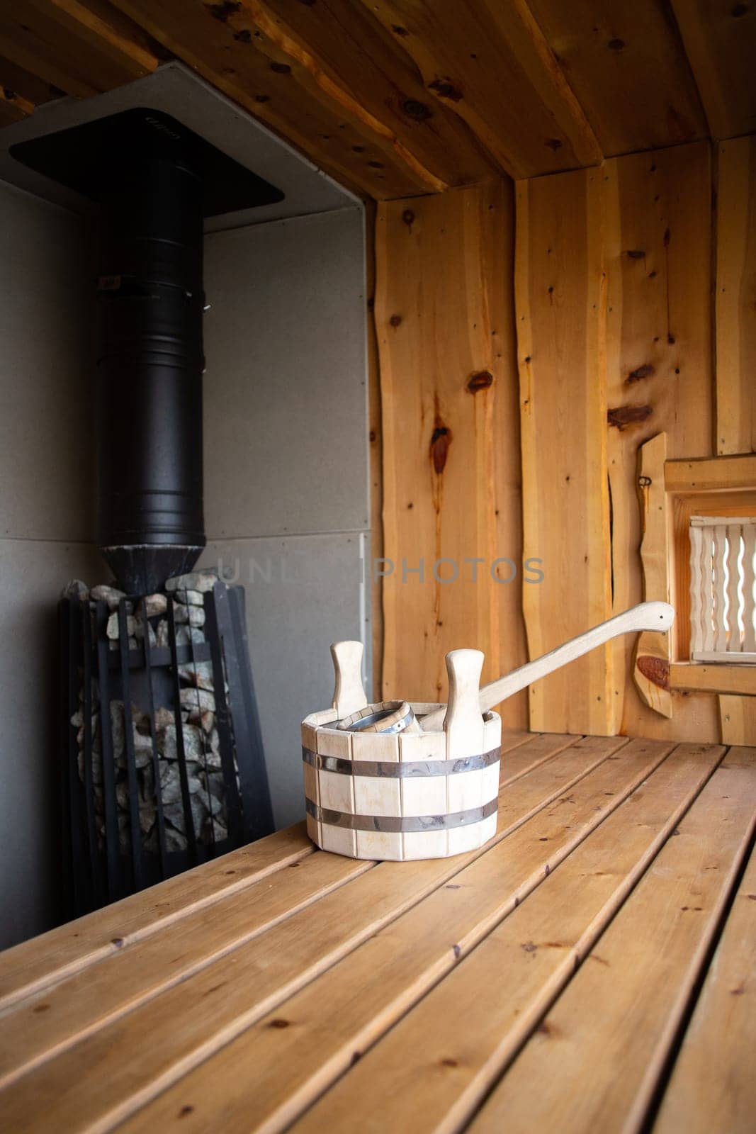 wooden tub in the bath on the shelf.