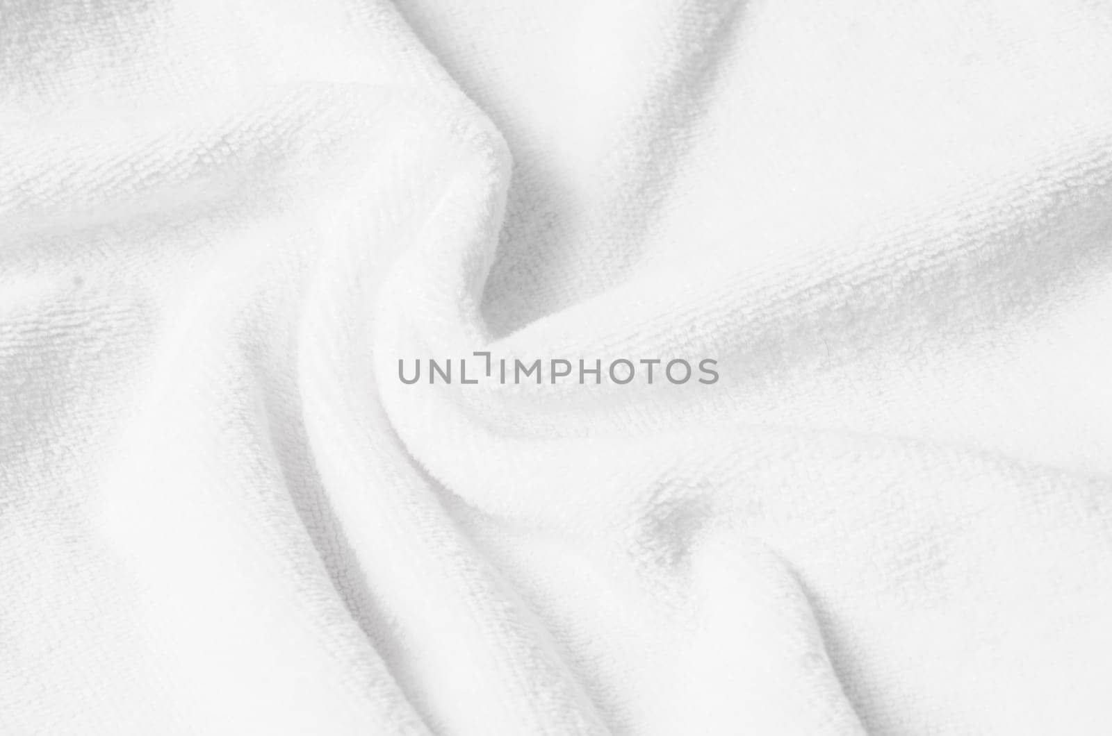 The Terry towel texture, top view of a white bath towel by Gamjai