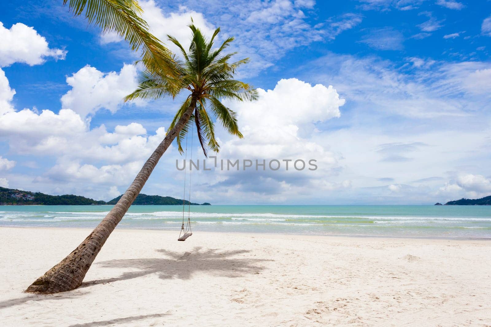 The Patong beach in Phuket, Thailand. Phuket is a popular destination famous for its beaches. by Gamjai