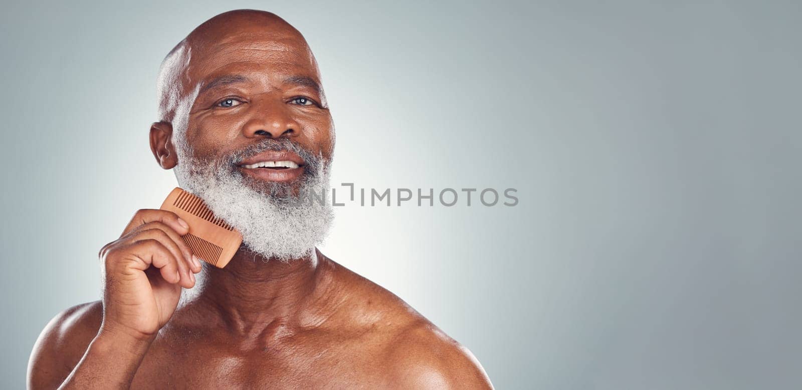 Grooming, comb and beard with face of black man for beauty, hygiene and skincare with mockup. Self care, facial hair and barber with model for health, wellness and cleaning in studio background.