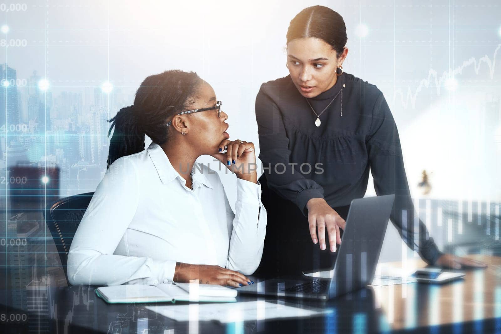 Business women, laptop with investment and overlay graphs, communication and collaboration, global financial statistics and trading. Fintech, discussion and ux with futuristic finance hologram and ui.