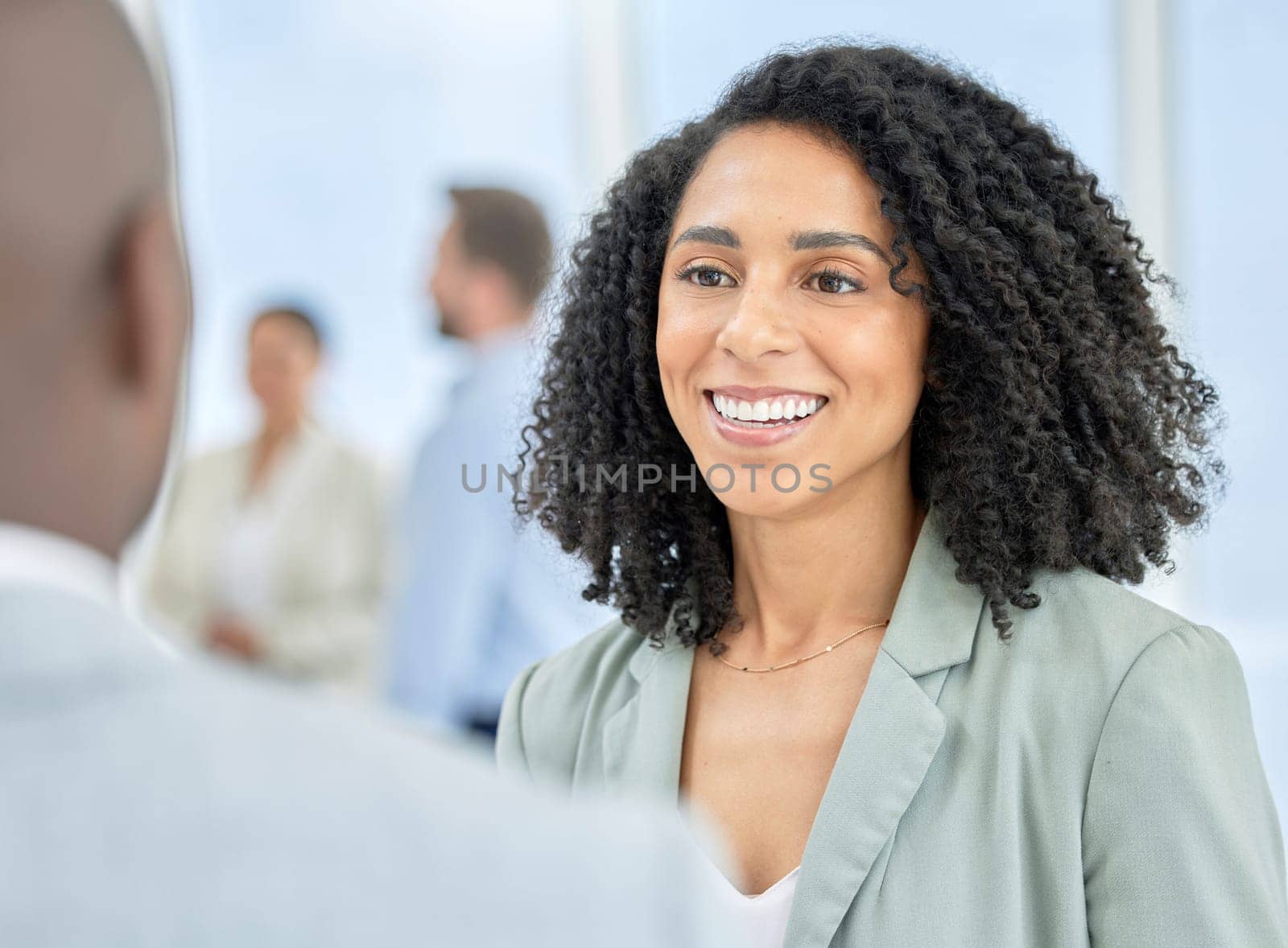 Black woman, business employee and networking conversation of a lawyer talking. Happiness, smile and law consultant with worker communication in a office at a workplace happy about leadership.