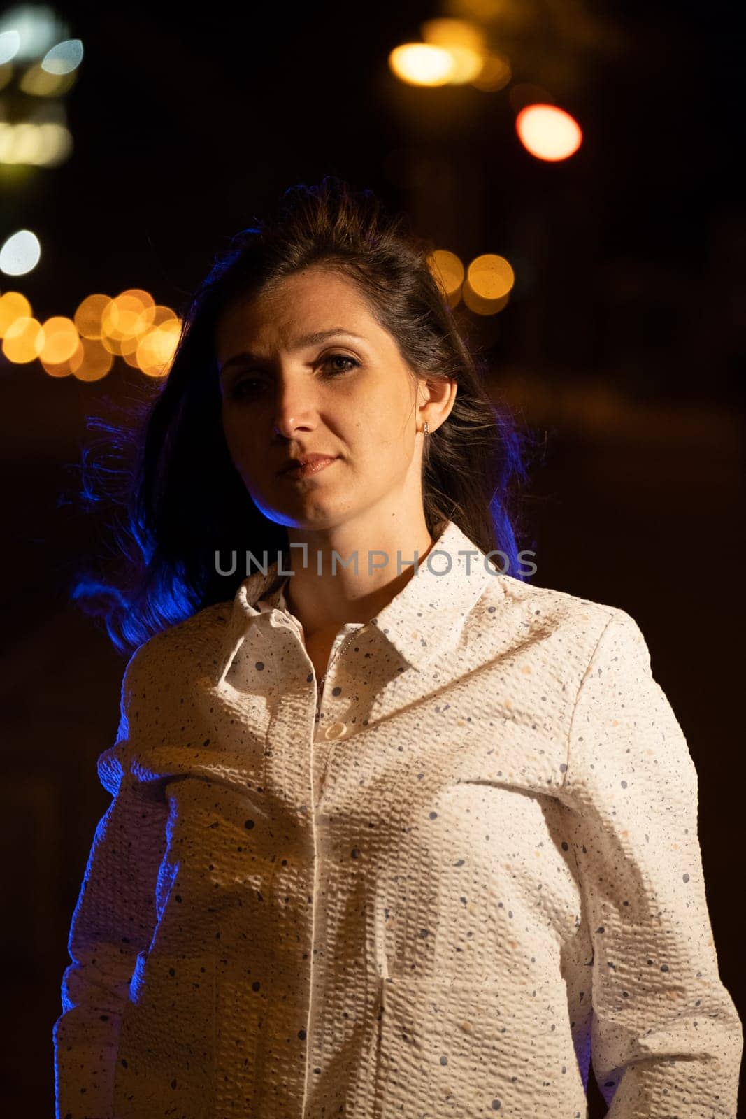 gorgeous brunette girl portrait in night city lights. Vogue fashion style by igor010
