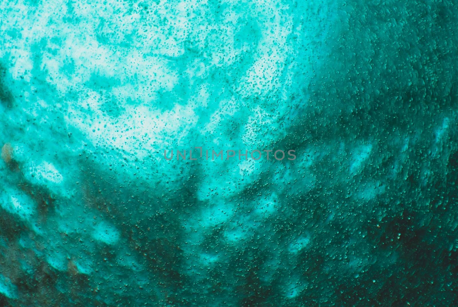 abstract green background. water glitter turquoise texture.