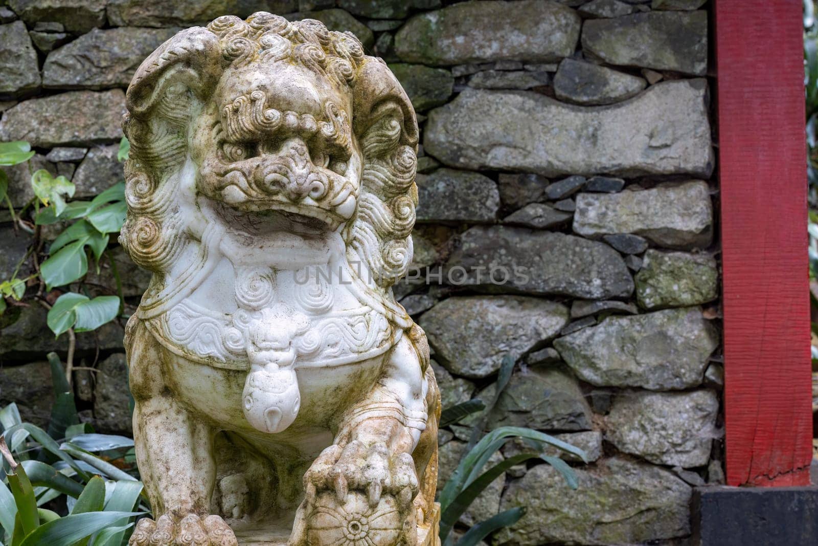 A lion statue in the Monte Palace Tropical Gardens, Monte (near Funchal), Madeira, Portugal