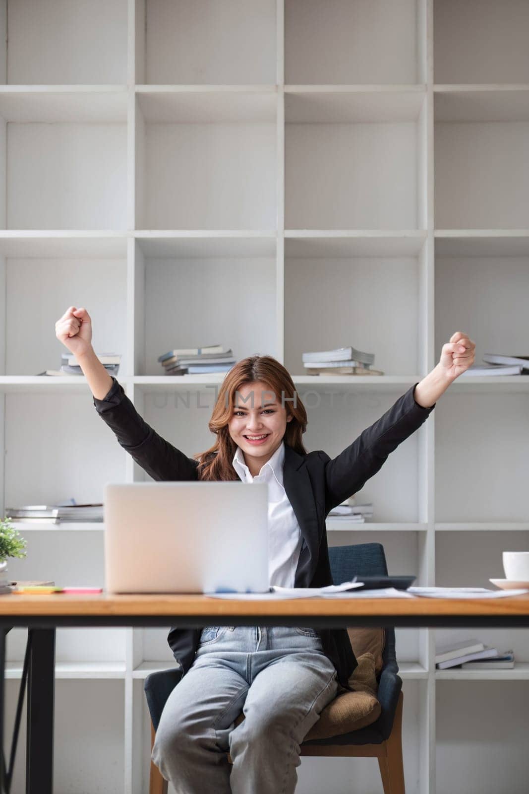 Excited female feeling euphoric celebrating online win success achievement result, young woman happy about good email news, motivated by great offer or new opportunity, passed exam, got a job..