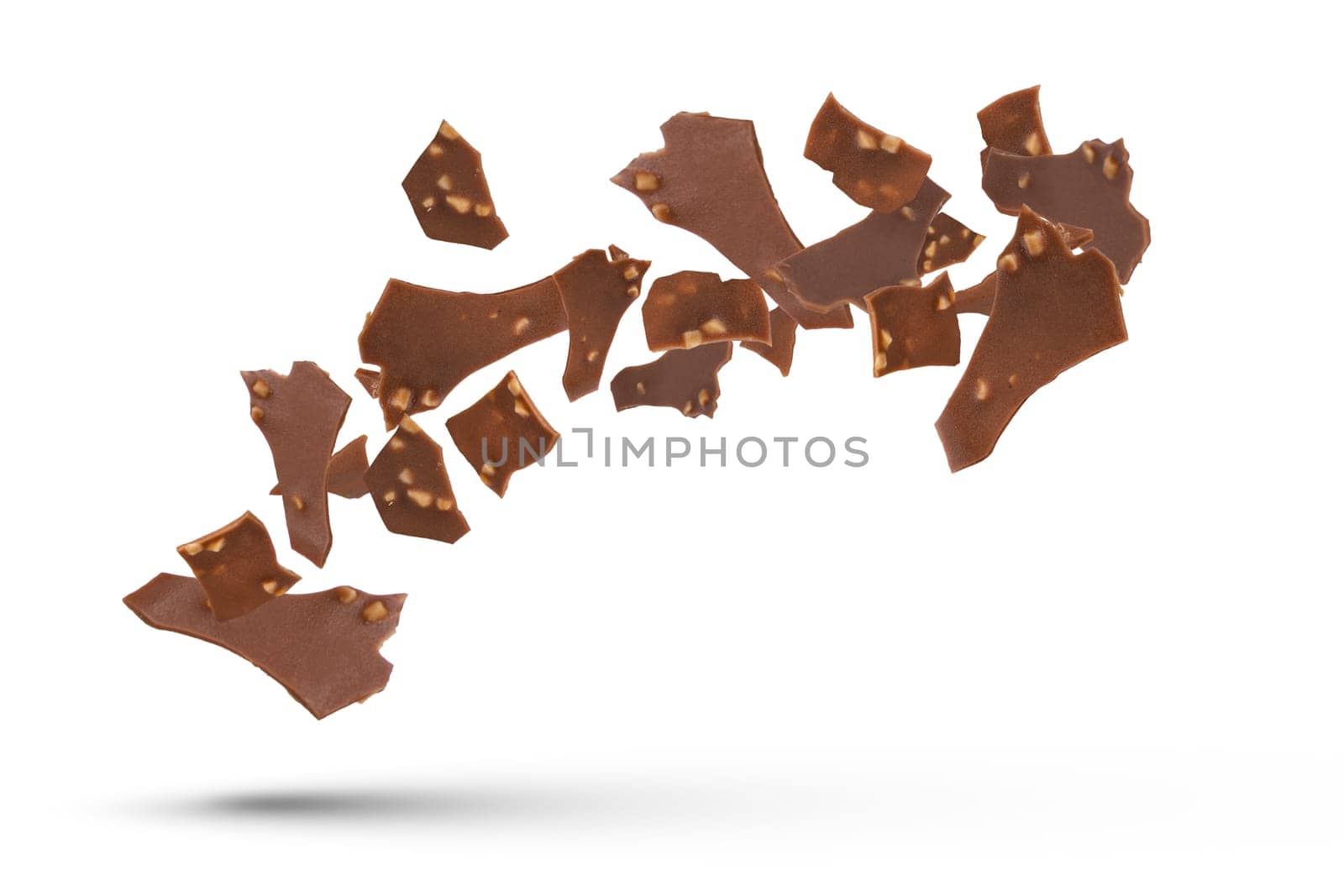 Chocolate pieces of ice cream glaze with nuts. Pieces of chocolate fall on a white isolated background. Suitable for pasting into a design or project. by SERSOL