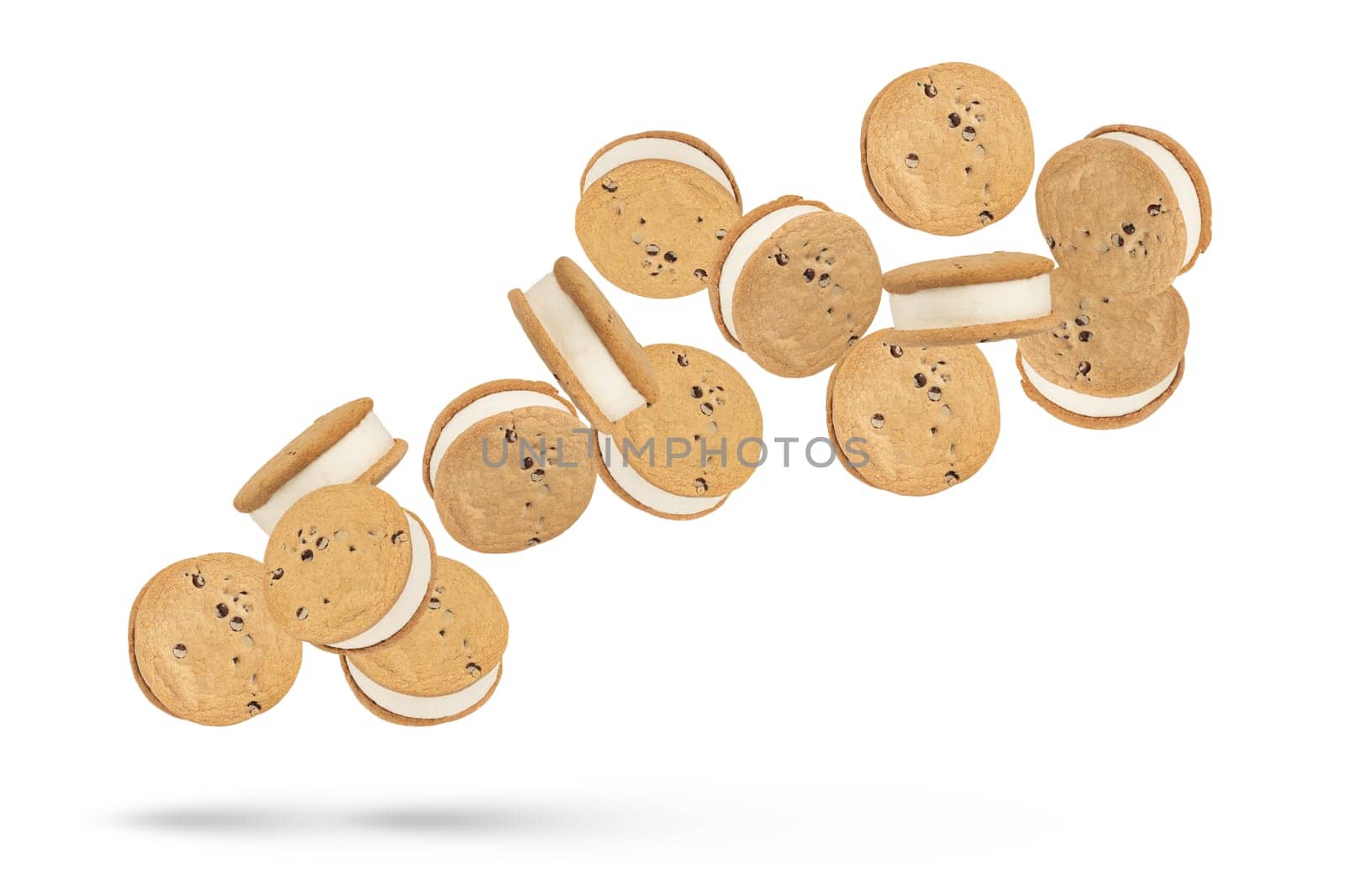 Ice cream in the form of a sandwich isolated on a white background. Vanilla ice cream scattered in different directions on a white background. Suitable for pasting into a design or project