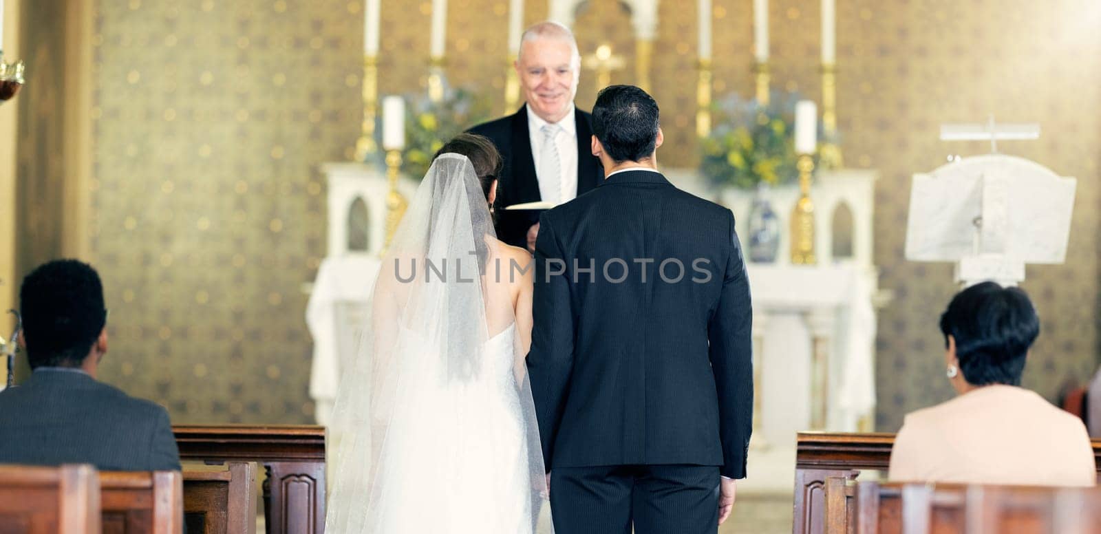 Couple, wedding and priest with commitment, love and marriage ceremony in church service together. Man, woman and pastor with trust, celebration and christian marry event in a chapel or spiritual by YuriArcurs