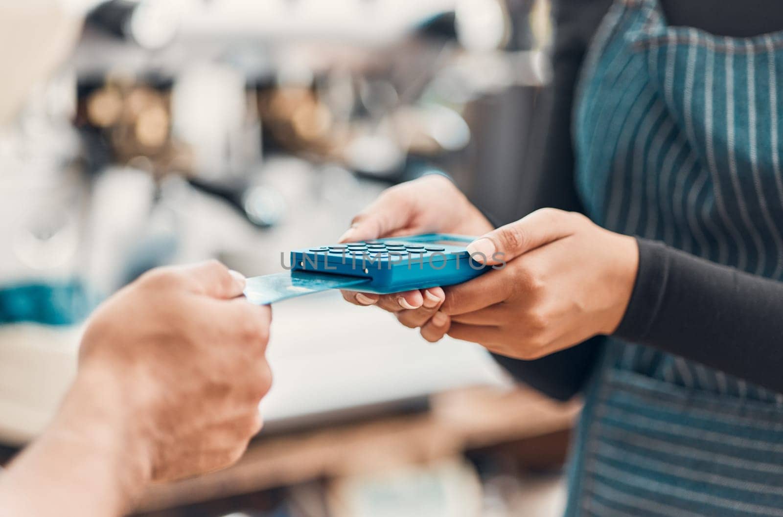 Credit card, machine and hands for payment in a coffee shop for shopping, bills or sale with technology. Contactless paying, electronic transaction or closeup of cafe customer at cashier for checkout.