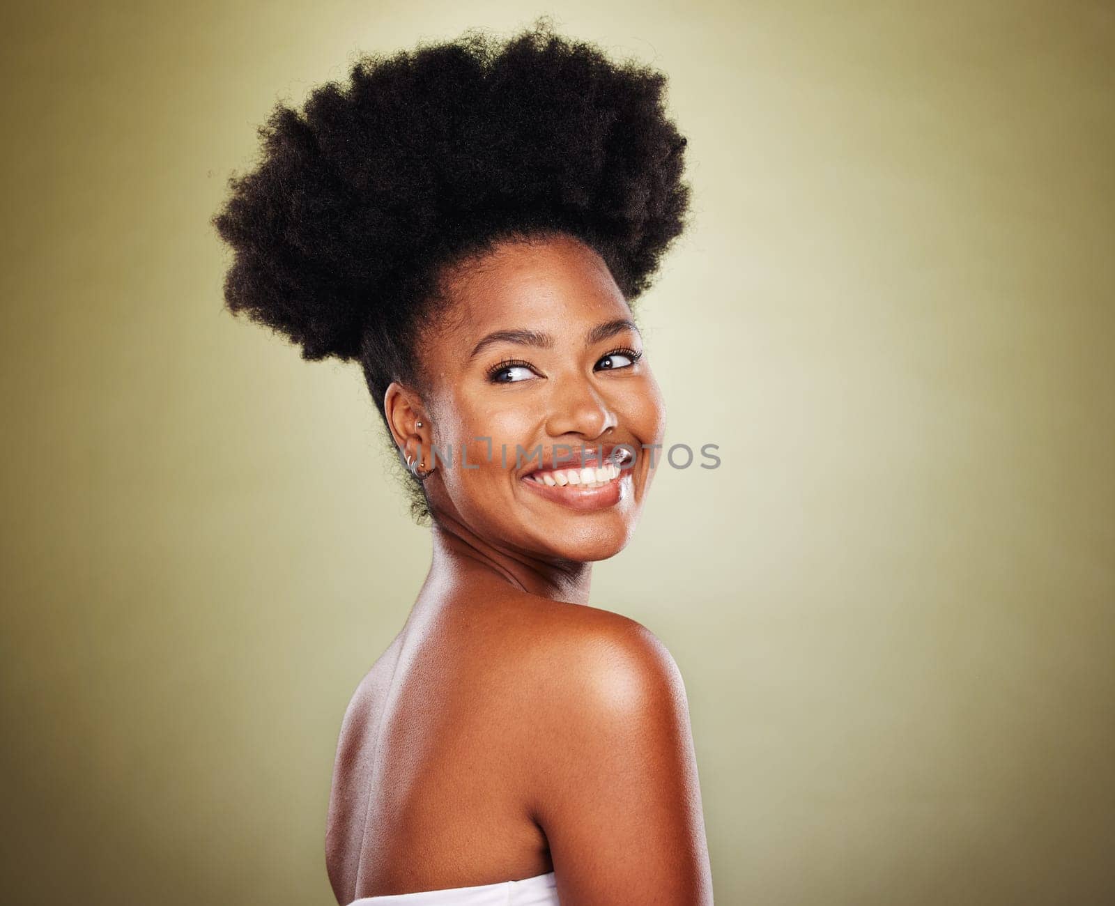 Skincare, black woman and natural beauty in studio for wellness, healthy glow and hair growth on green background mockup for marketing. Happy young african woman model with cosmetics skin care shine.