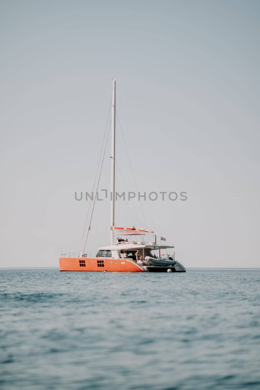 Aerial boat race. Luxury cruise trip. View from above of white boat on deep blue water. Aerial view of rich yacht sailing sea. Motor boat racing wave. Summer journey on luxury ship