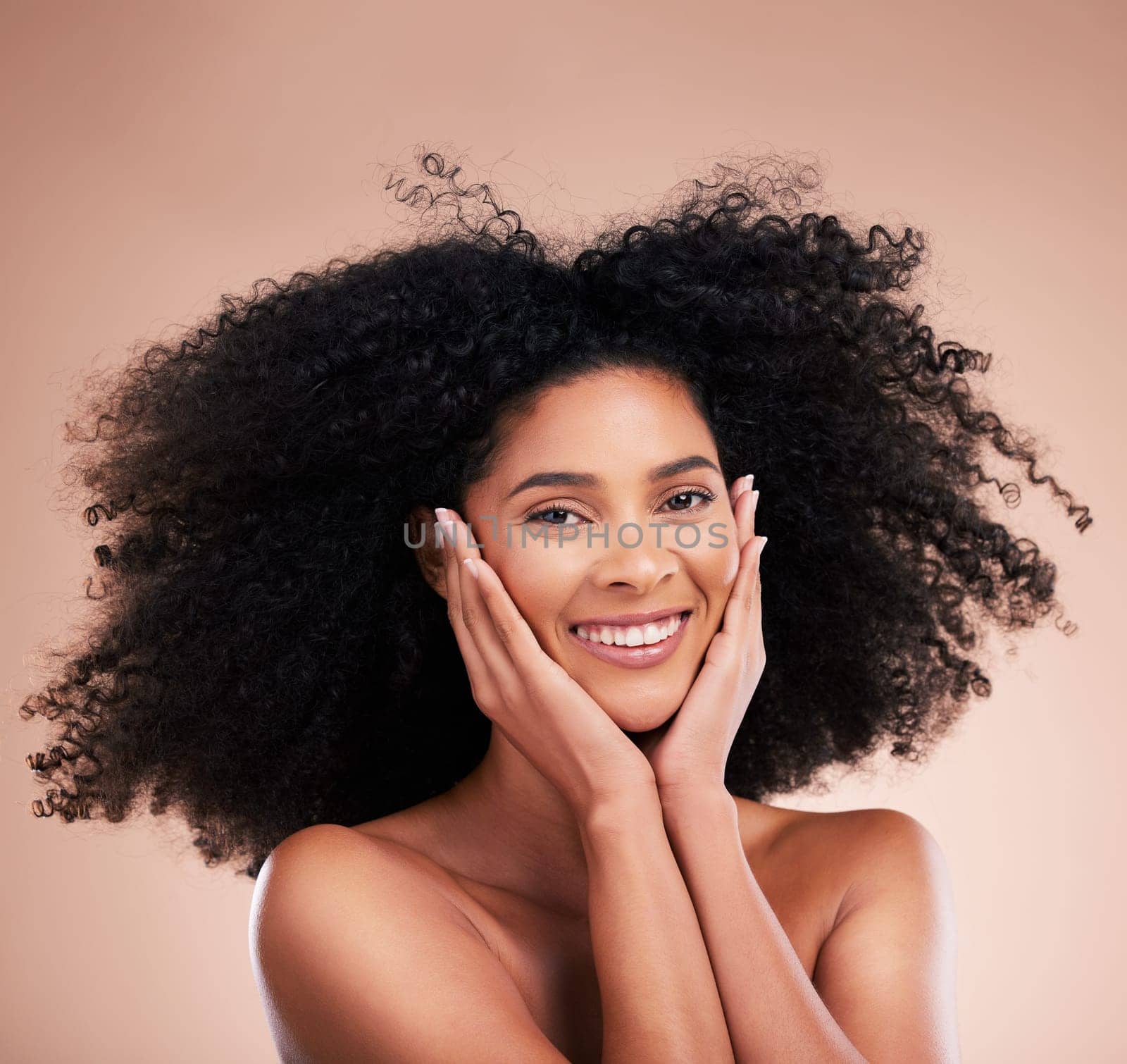 Happy model, portrait and afro hair on studio background in aesthetic wellness, curly texture pride or skincare glow. Black woman beauty, happy or smile with natural hairstyle, face hands or isolated.