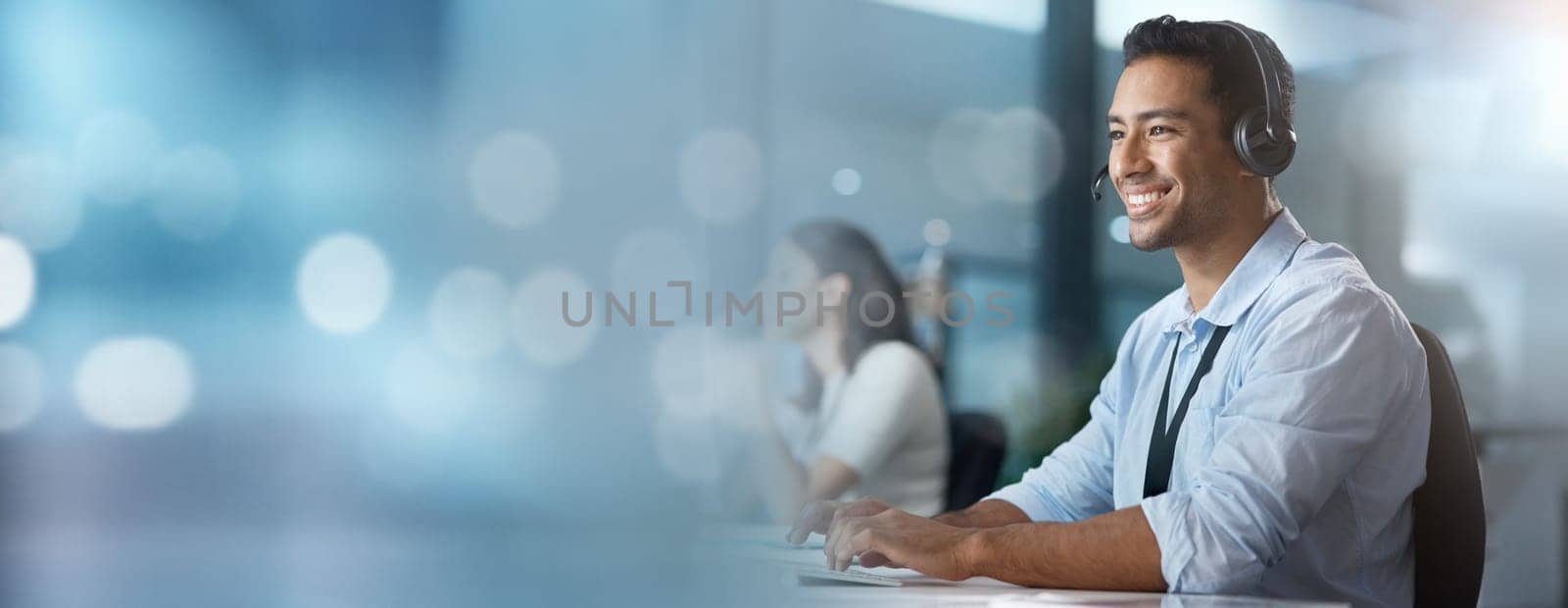 Crm, mockup or consultant typing in a call center helping, talking or networking online via email. Digital, happy Asian man or insurance agent smiles in communication at customer services or sales.