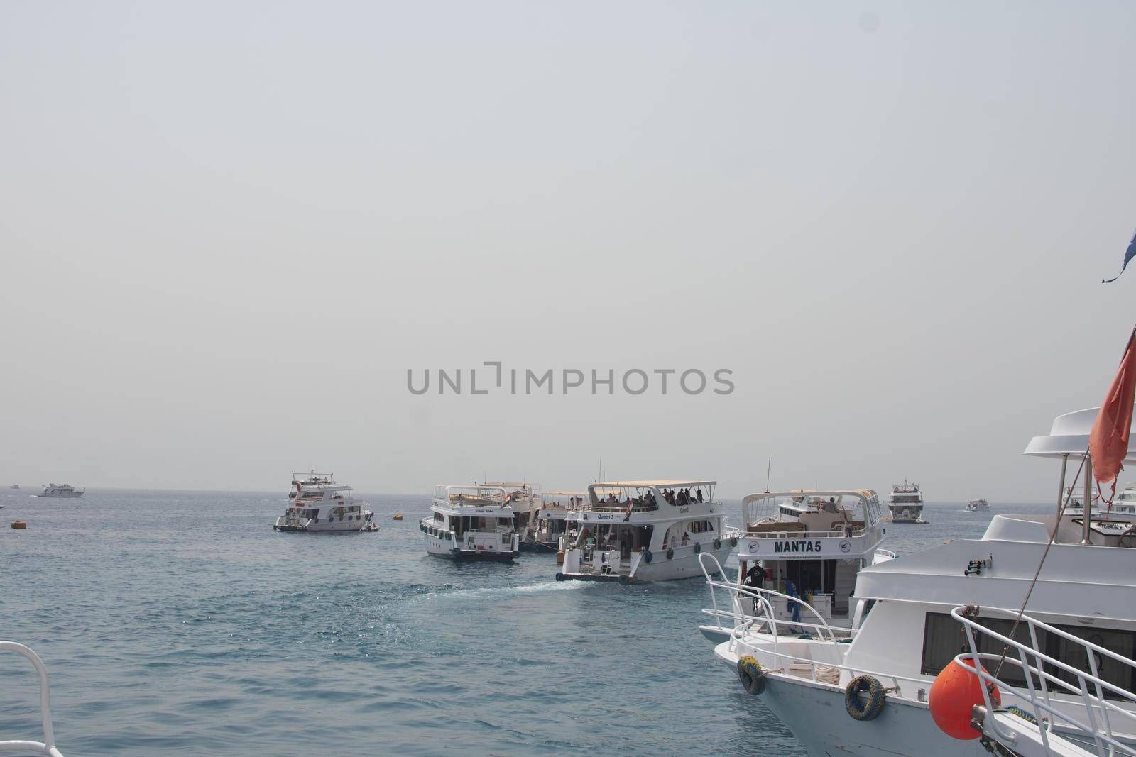 Egypt, Sharm el-Sheikh, Red Sea - August 05. 2021: marine haven. yachts take tourists on a boat trip. many yachts. EDITORIAL