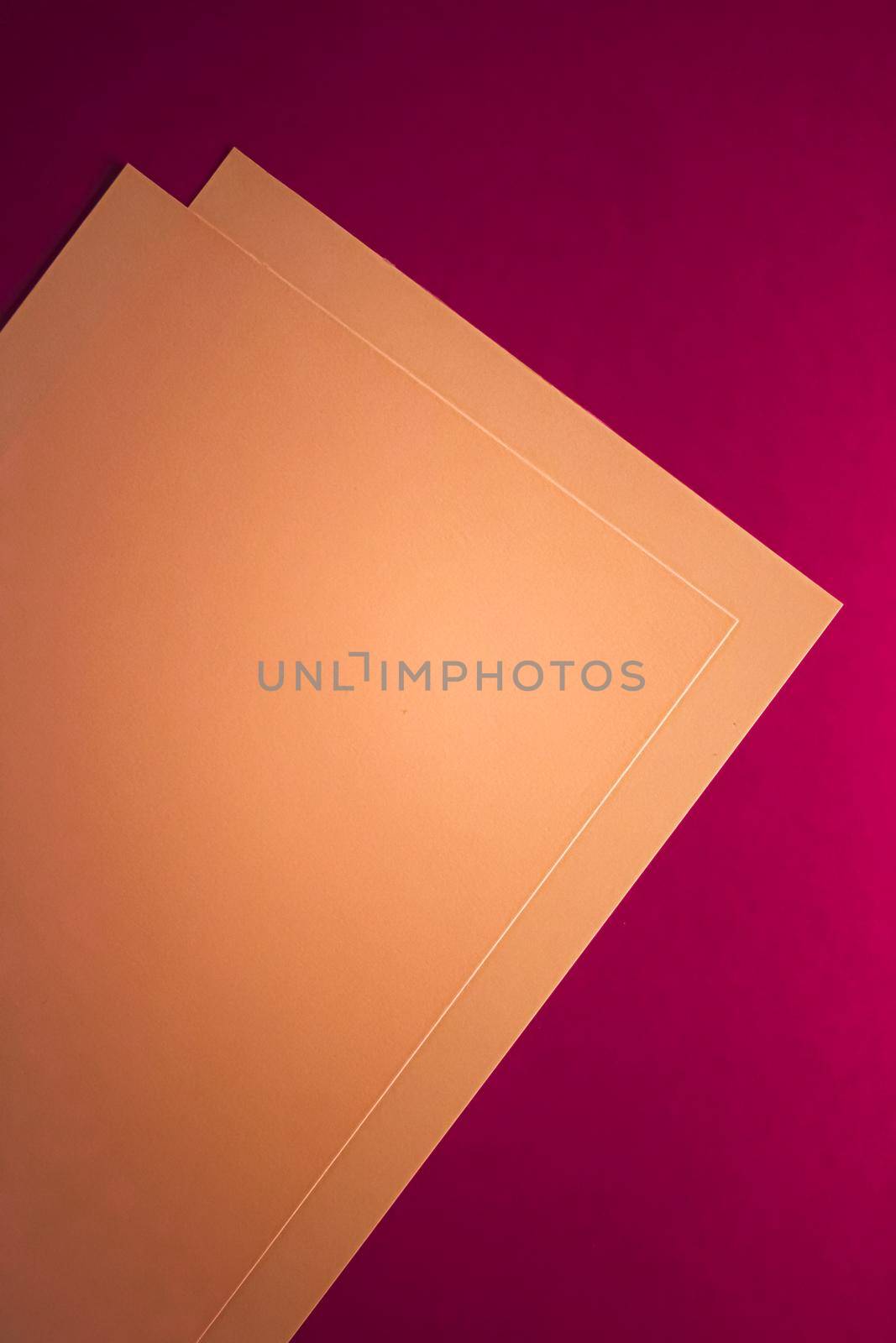 Blank A4 paper, brown on pink background as office stationery flatlay, luxury branding flat lay and brand identity design for mockup.