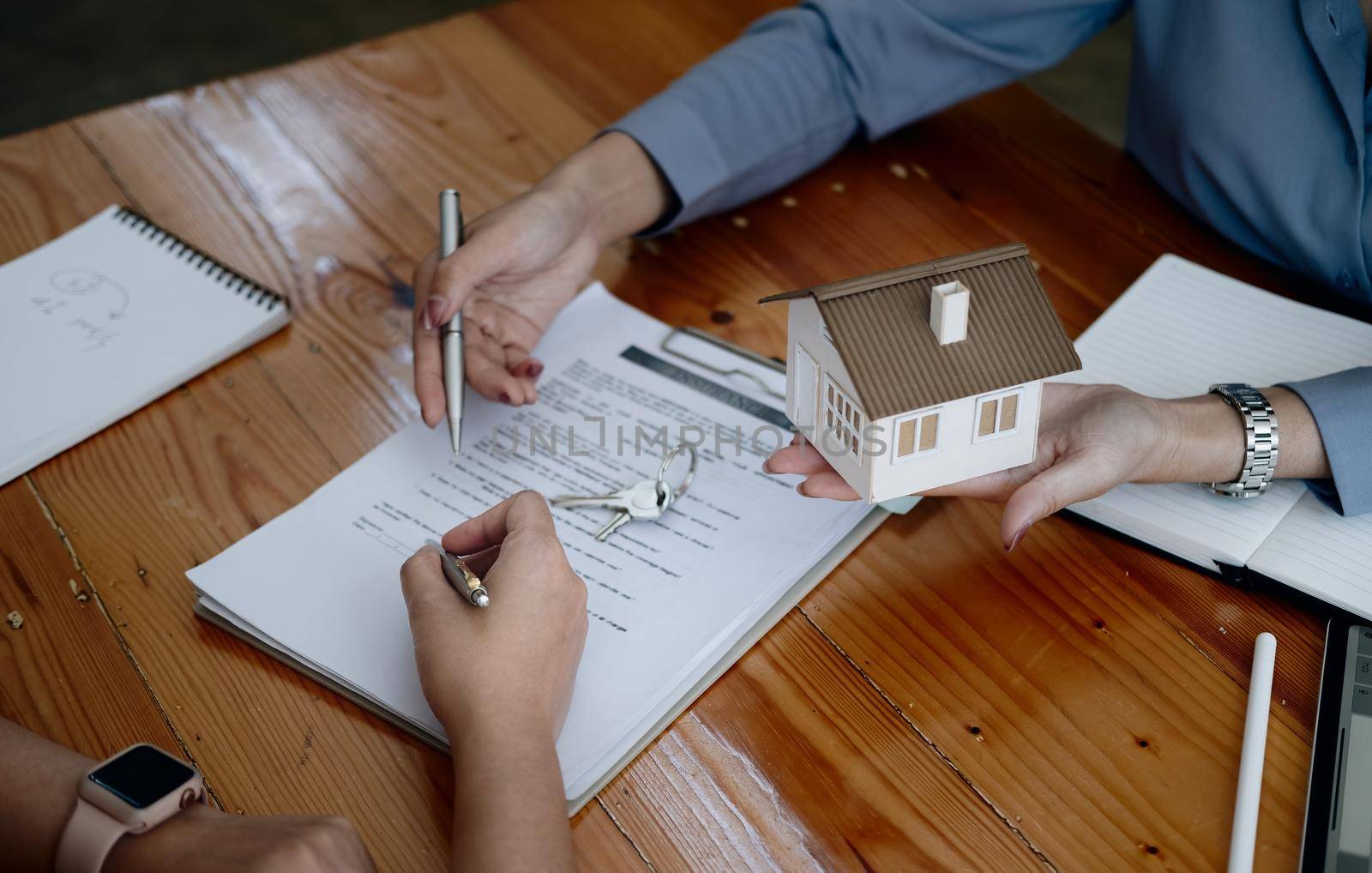 legal consultants, notary or justice lawyer discussing contract document on desk with client customer in courtroom office, business, justice law, insurance, legal service, buy and sell house concept.