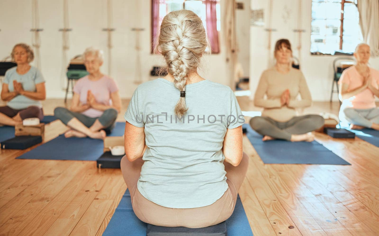 Yoga, personal trainer and senior women group for meditation, wellness and spiritual lifestyle with support, community and retirement. Fitness, pilates and cardio elderly people meditate with coach by YuriArcurs