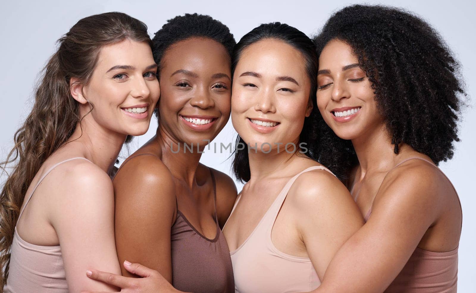 Face portrait, beauty and group of women in studio on gray background. Cosmetics, makeup and diversity of female models with glowing and flawless skin after spa facial treatment posing for skincare