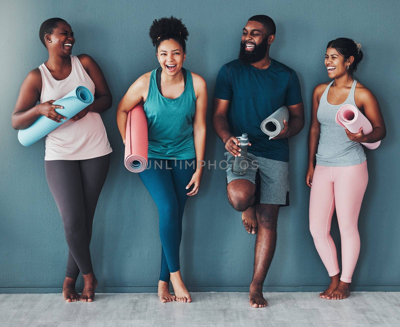 Fitness, diversity and portrait friends at the gym for training, laughing and happy for exercise at a club. Smile, sports and man with women in a group for a workout, cardio or yoga in a room by YuriArcurs