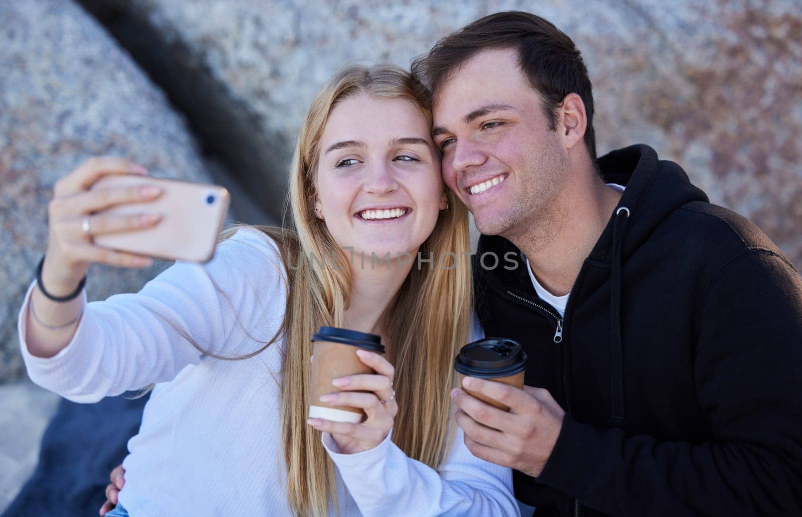 Love, selfie and couple outdoor, smile and summer vacation for relationship, romance and bonding. Romantic, man and woman with smartphone, picture for memory or loving together on break and affection.