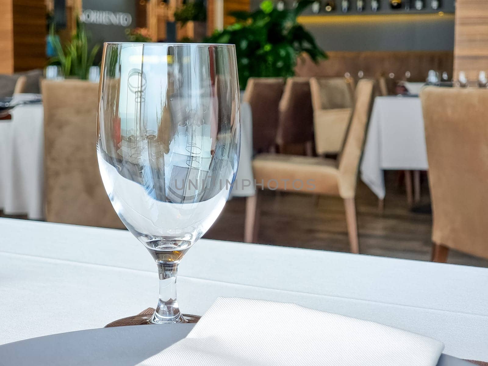 Empty glasses set in restaurant. Part of interior
