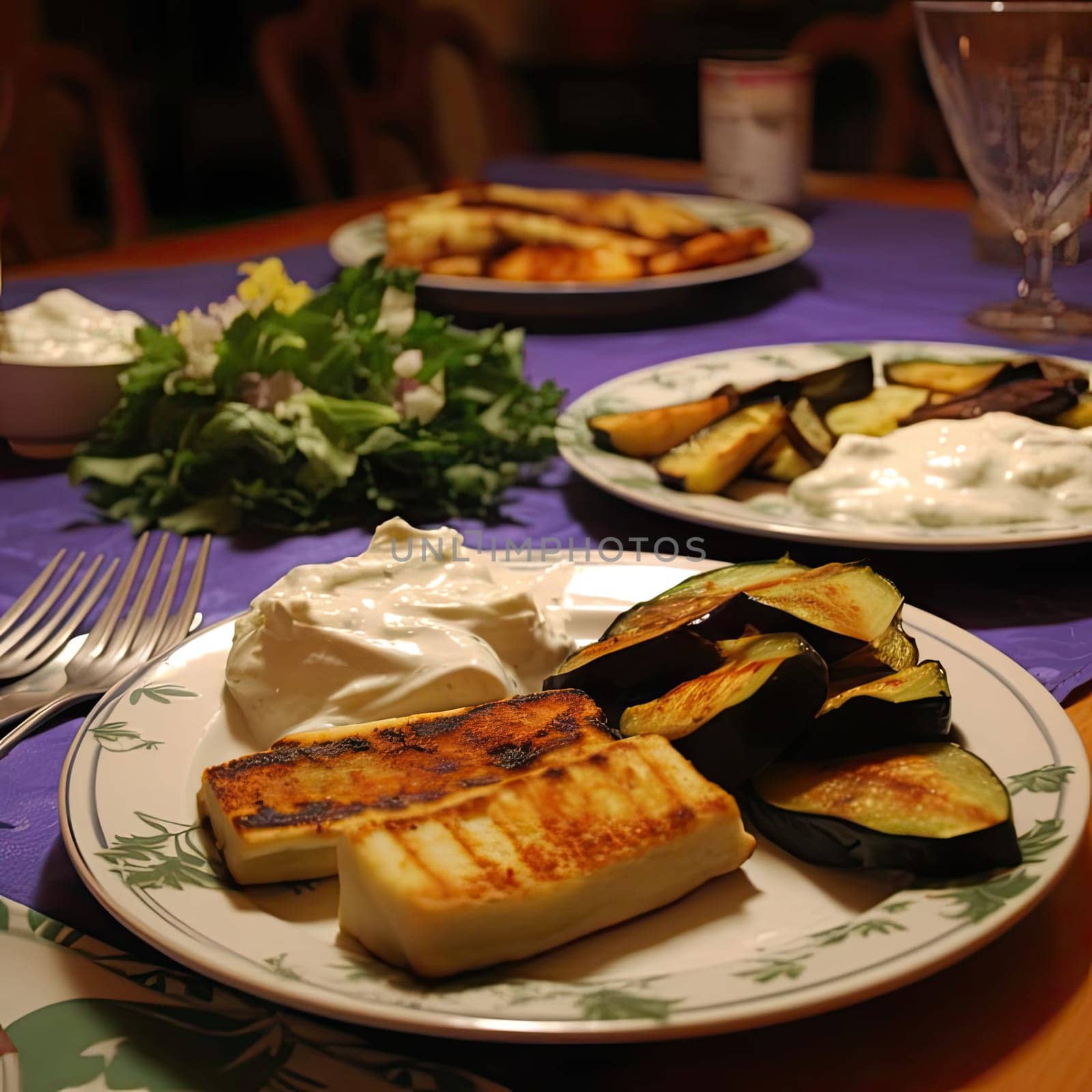 Grilled aubergine with cheese and sour cream on a plate (ID: 001261)