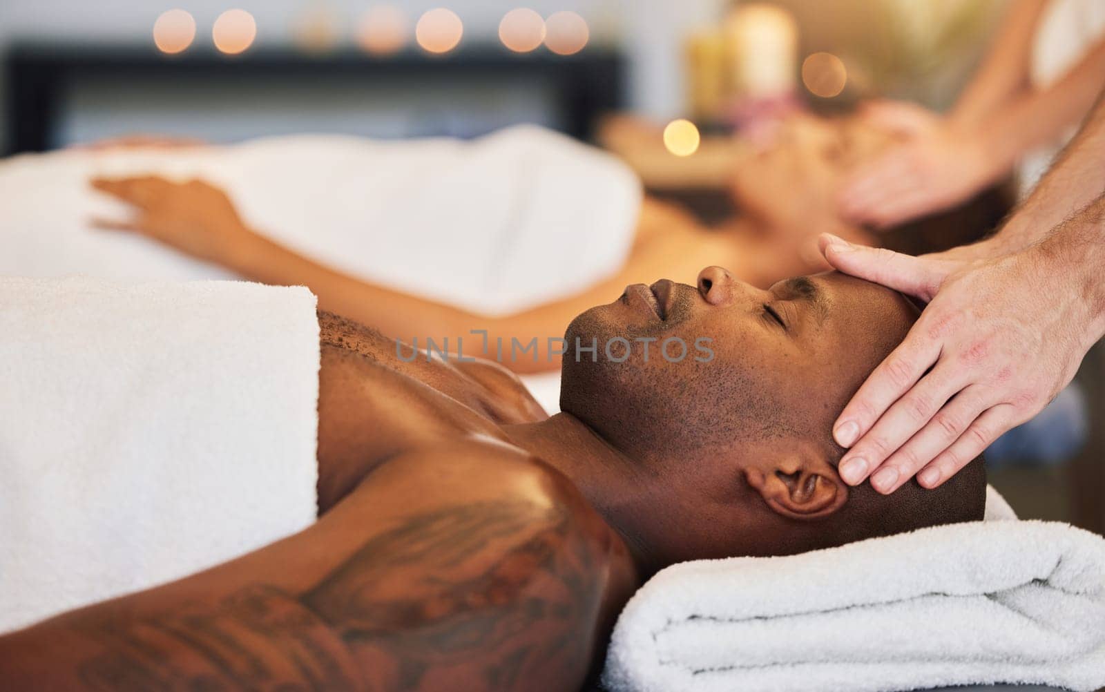 Relax, spa and head massage with couple together for health, beauty and zen therapy. Luxury, wellness and peace with hands of massage therapist and man and woman for salon, cosmetics and healing by YuriArcurs