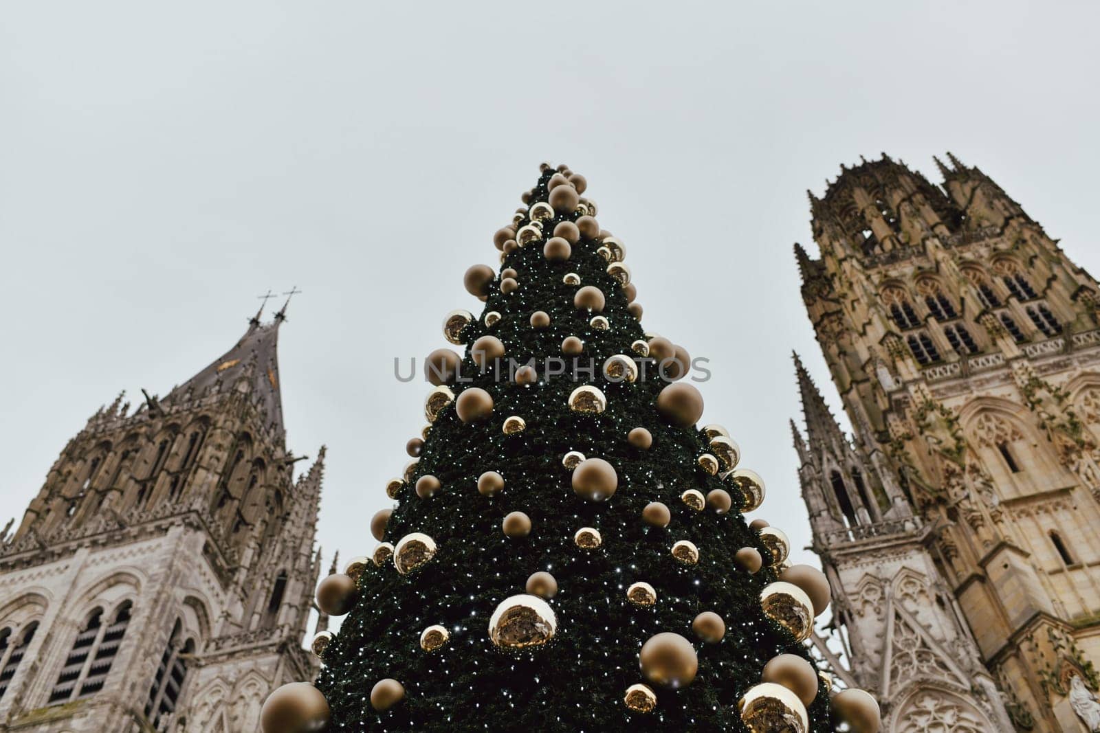 Decorated Christmas tree and cathedral at Rouen