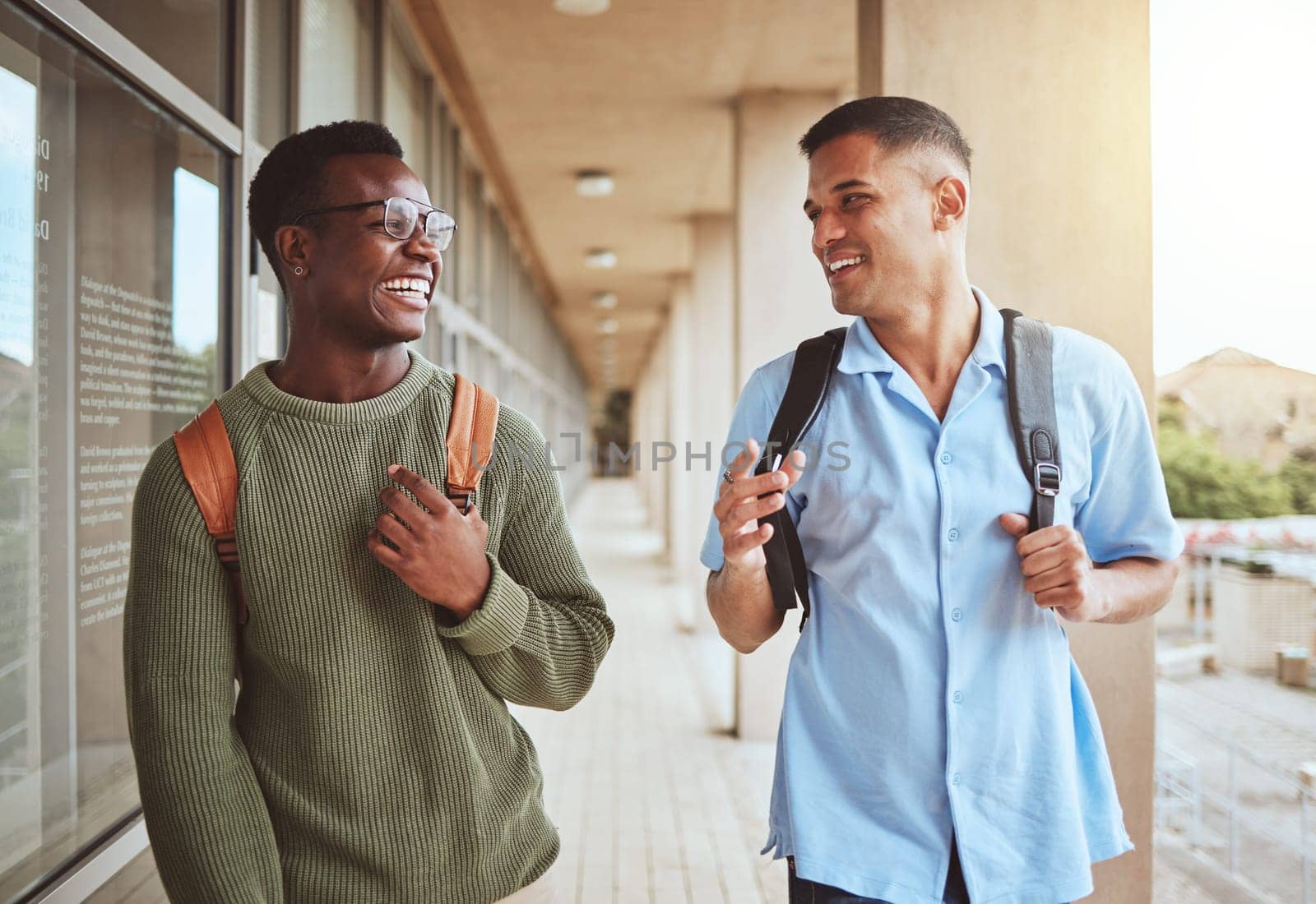 Men, students and friends with education and university, together talking and laughing with funny and study at college. Comedy, discussion and friendship communication, learning and happy outdoor.