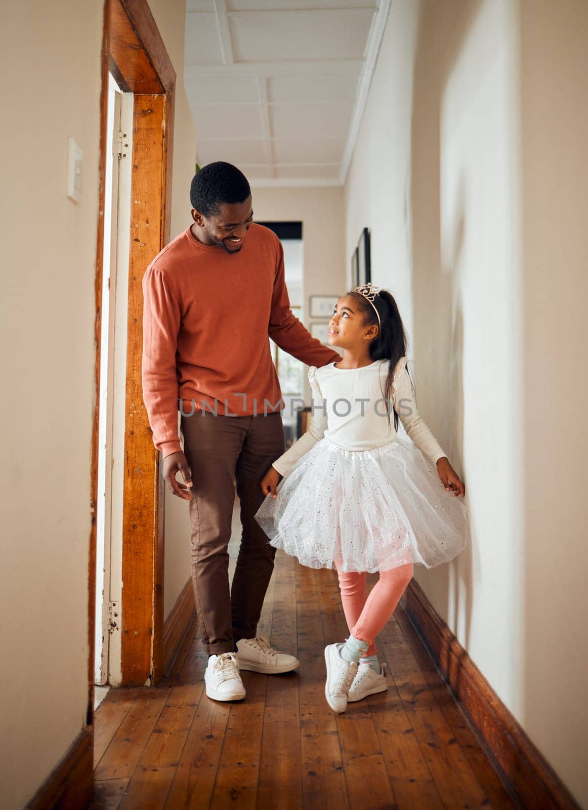 Family, princess and father with daughter in their home for dance, fun and playing indoors together. Black man, girl and parent bonding while dancing to music in their house, happy and smile by YuriArcurs