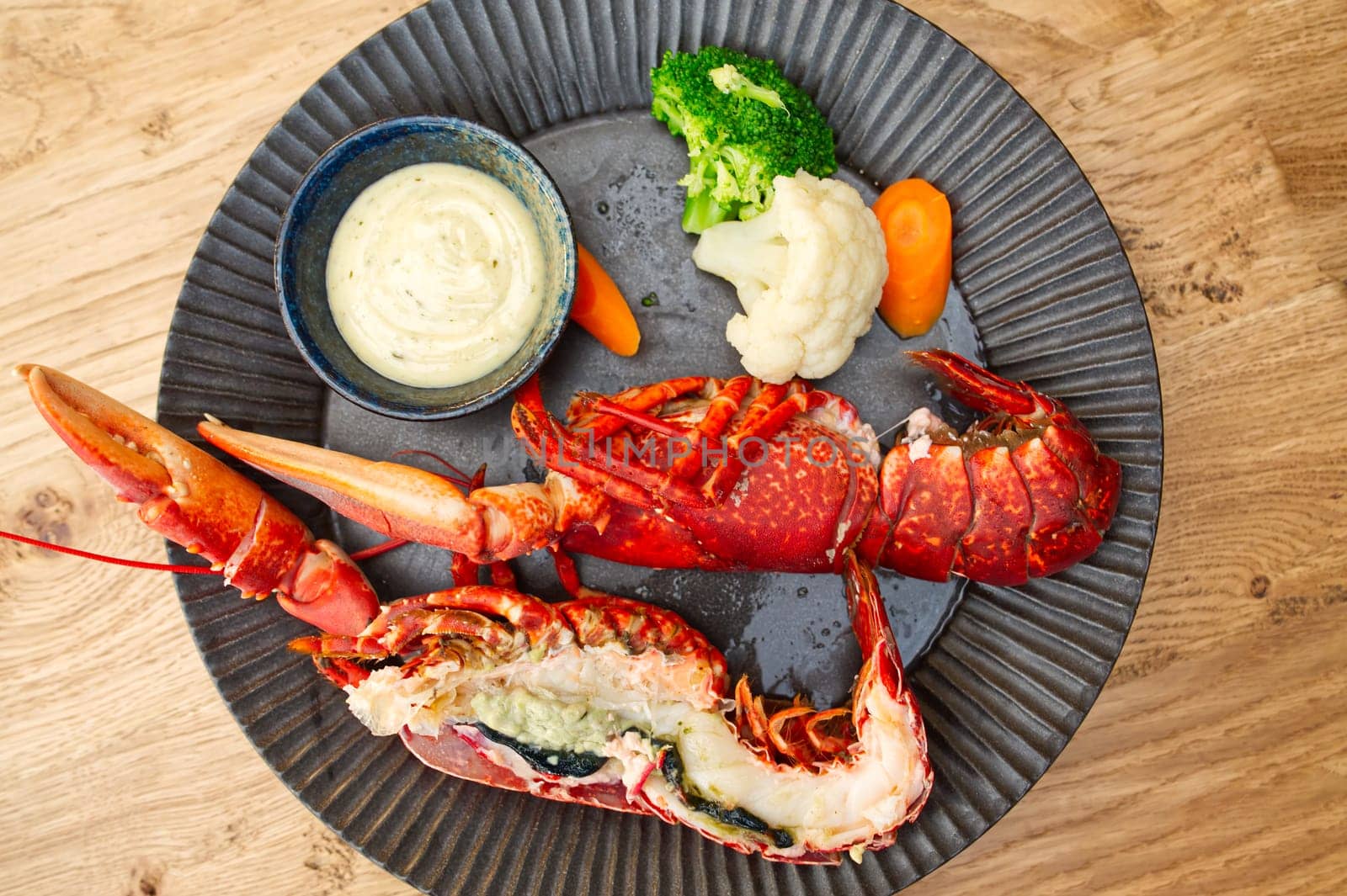 Cooked fresh lobster. Red lobster dinner seafood. Gourmet food healthy boiled lobster by PhotoTime