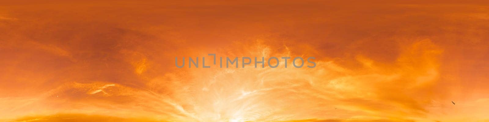 Bright sunset sky panorama with Cirrus clouds. Seamless hdr spherical equirectangular 360 panorama. Sky dome or zenith for 3D visualization, game and sky replacement for aerial drone 360 panoramas.