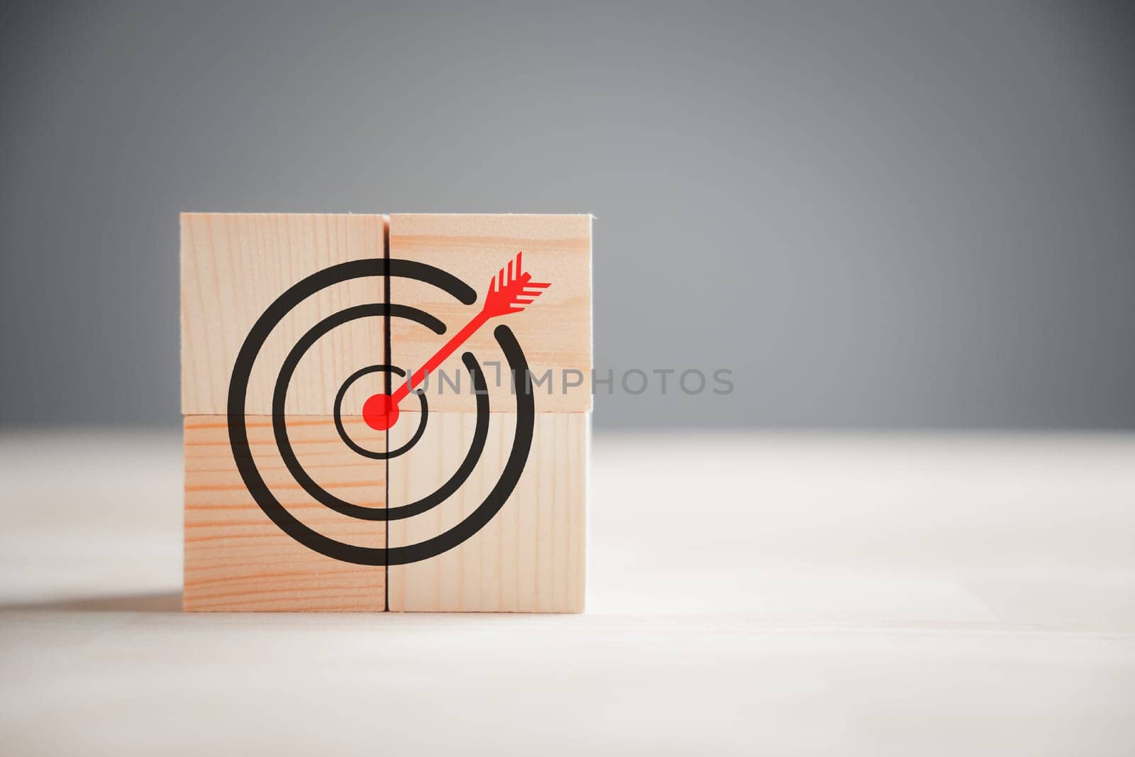 Action Plan, Goal, and Target icons on a wooden block step. Success and business target concept. Company strategy and project management symbolize achievement.
