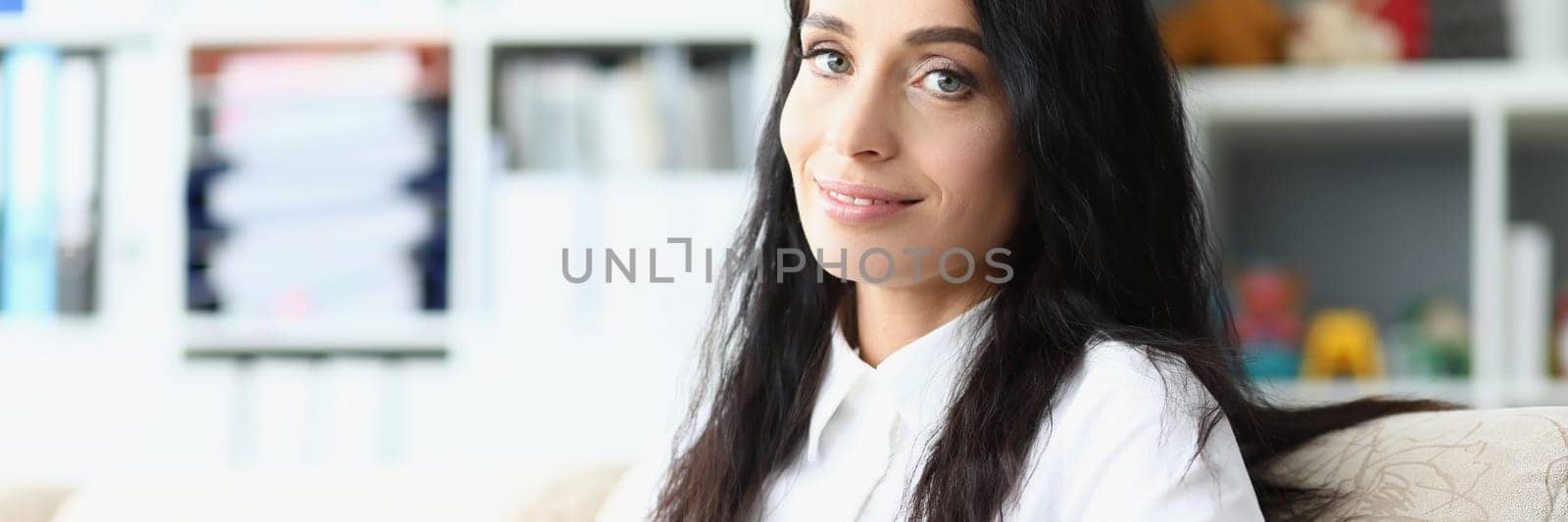 Happy attractive business woman holding tablet closeup by kuprevich