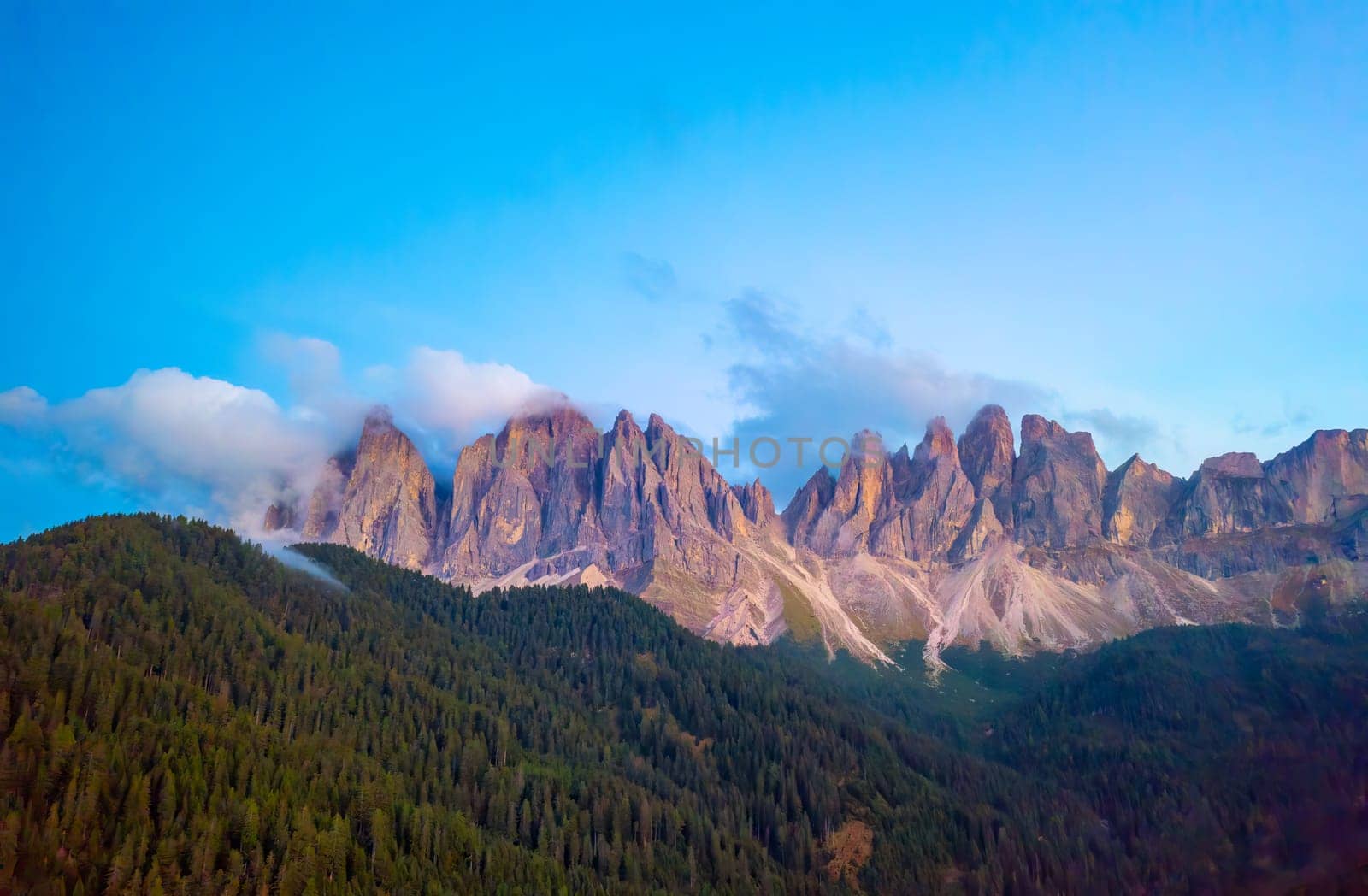 Rocky peaks of Dolomites Alps on Pass Giau at sunrise.