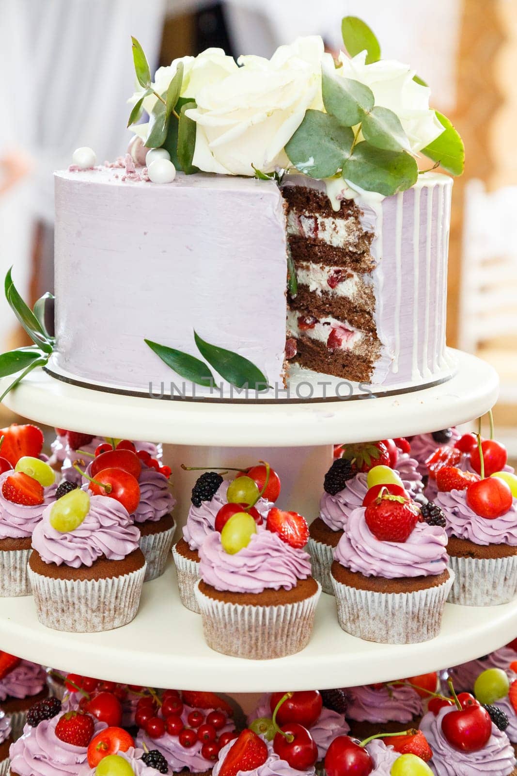 Beautiful and sweet wedding cake for newlyweds by Dmitrytph
