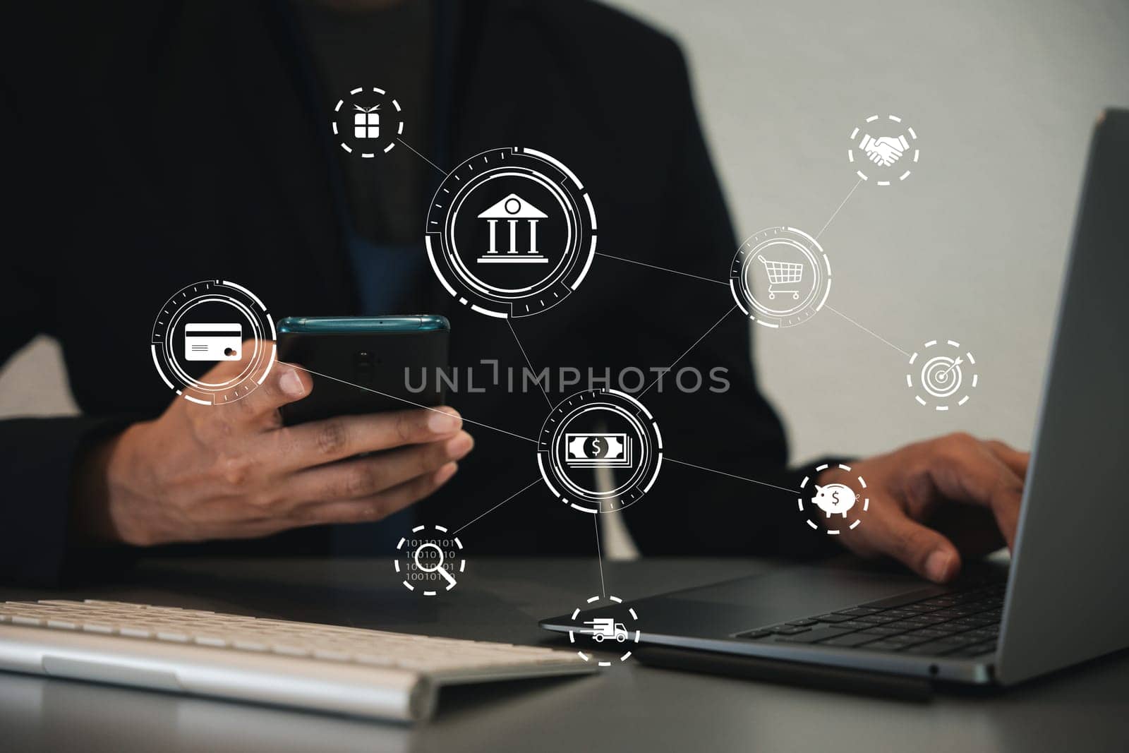 Close-up of a hand holding a credit card and smartphone. Man and woman shopping online together. Digital payment and e-commerce concept