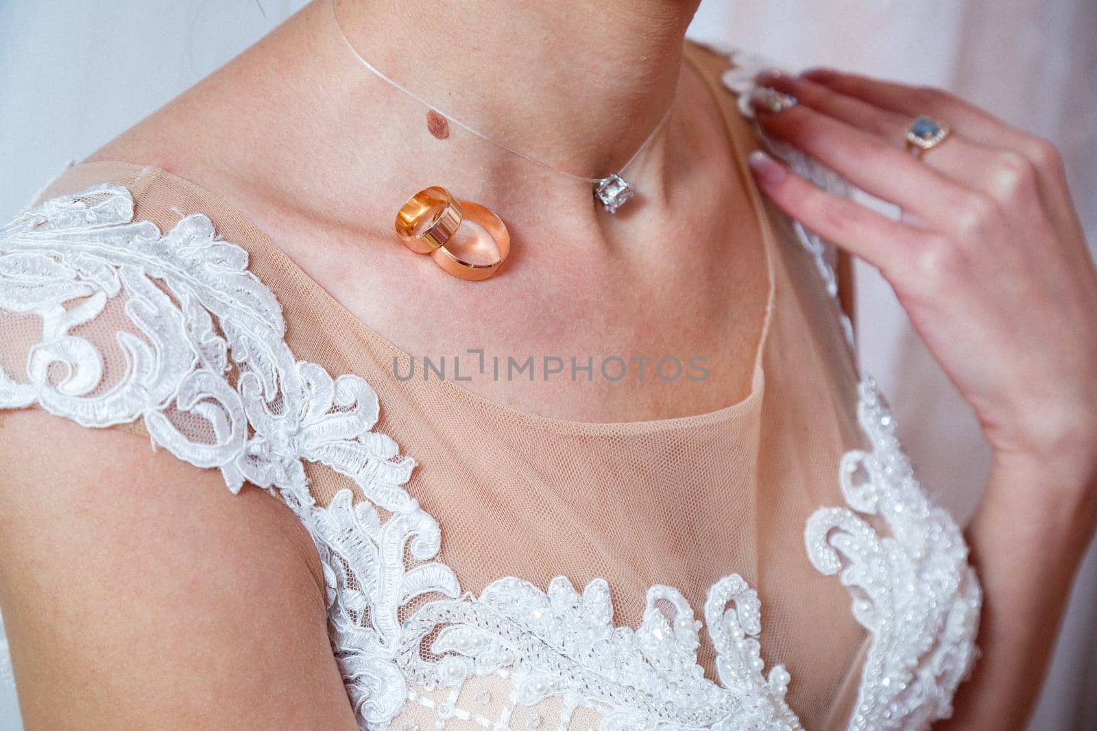 Golden wedding rings for newlyweds on their wedding day