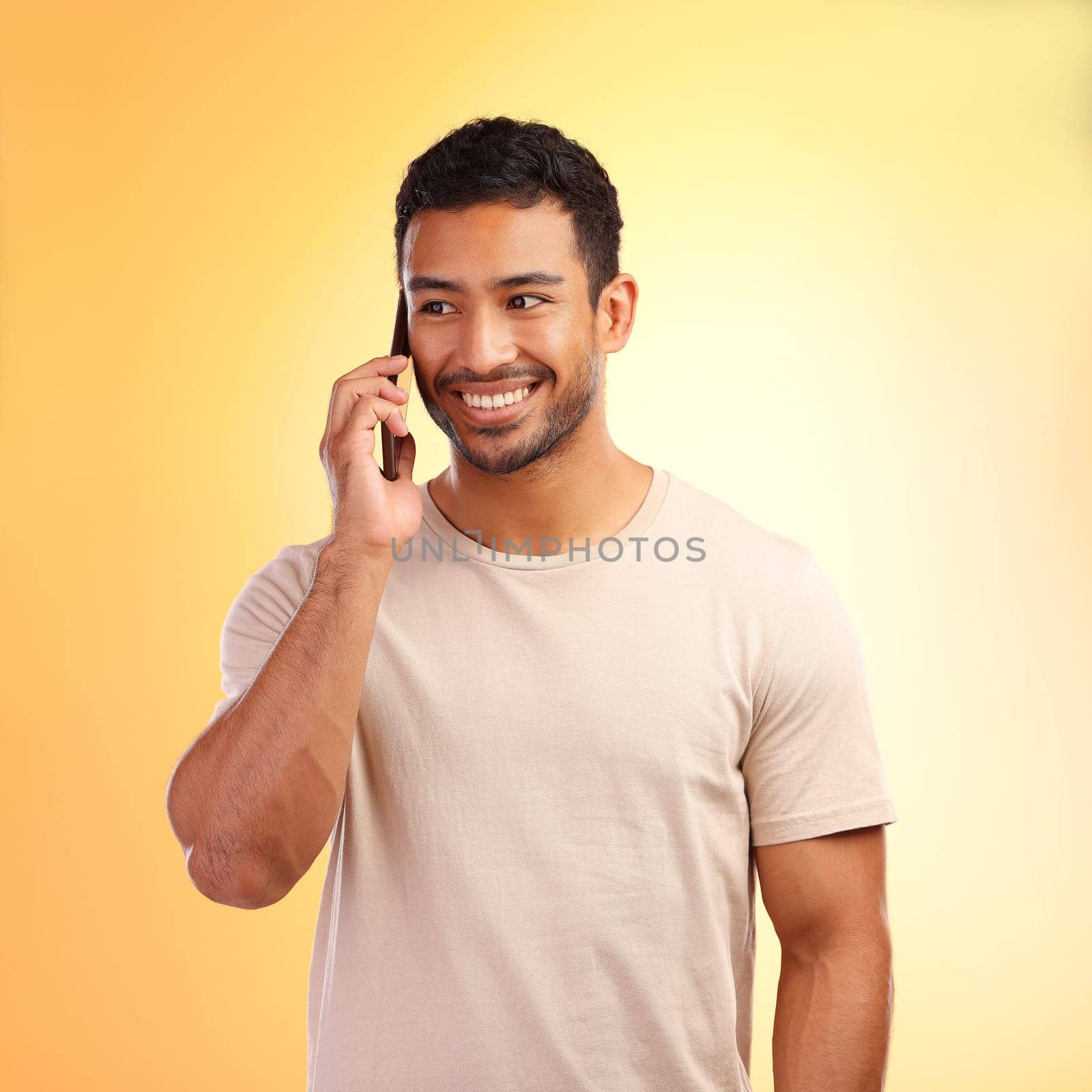 Man, studio and happy phone call conversation, listening and smile for information, news and networking. Model, smartphone communication and talking on mobile network, using phone and connection.