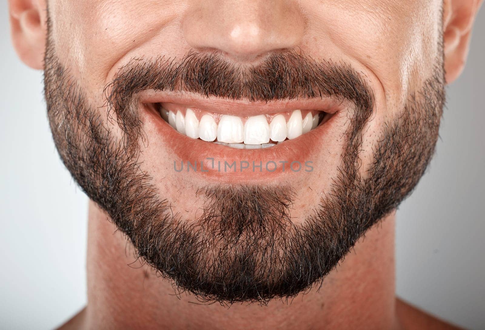 Smile, mouth and teeth whitening of man on studio background of wellness. Closeup male model face with clean dental, fresh breath and happy tooth implant, aesthetic beauty or healthy cosmetic results.