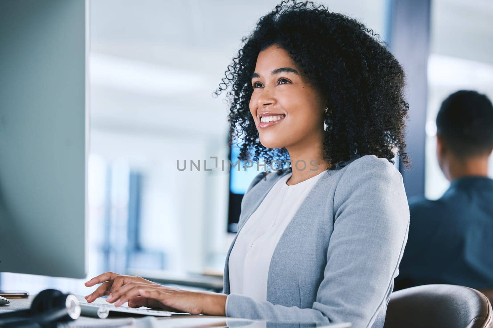 Woman, computer with tech support and typing email, consultant at desk with smile and online customer service. Contact center, communication and happy female agent with feedback and help at agency.