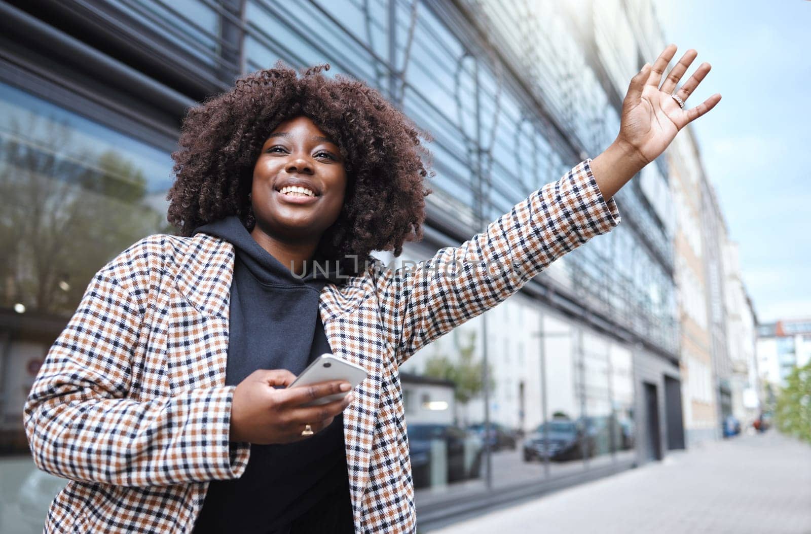 Taxi, hands and sign by black woman in city for travel, commute or waiting for transport on building background. Hand, bus and stop by girl in Florida for transportation service, app or drive request.