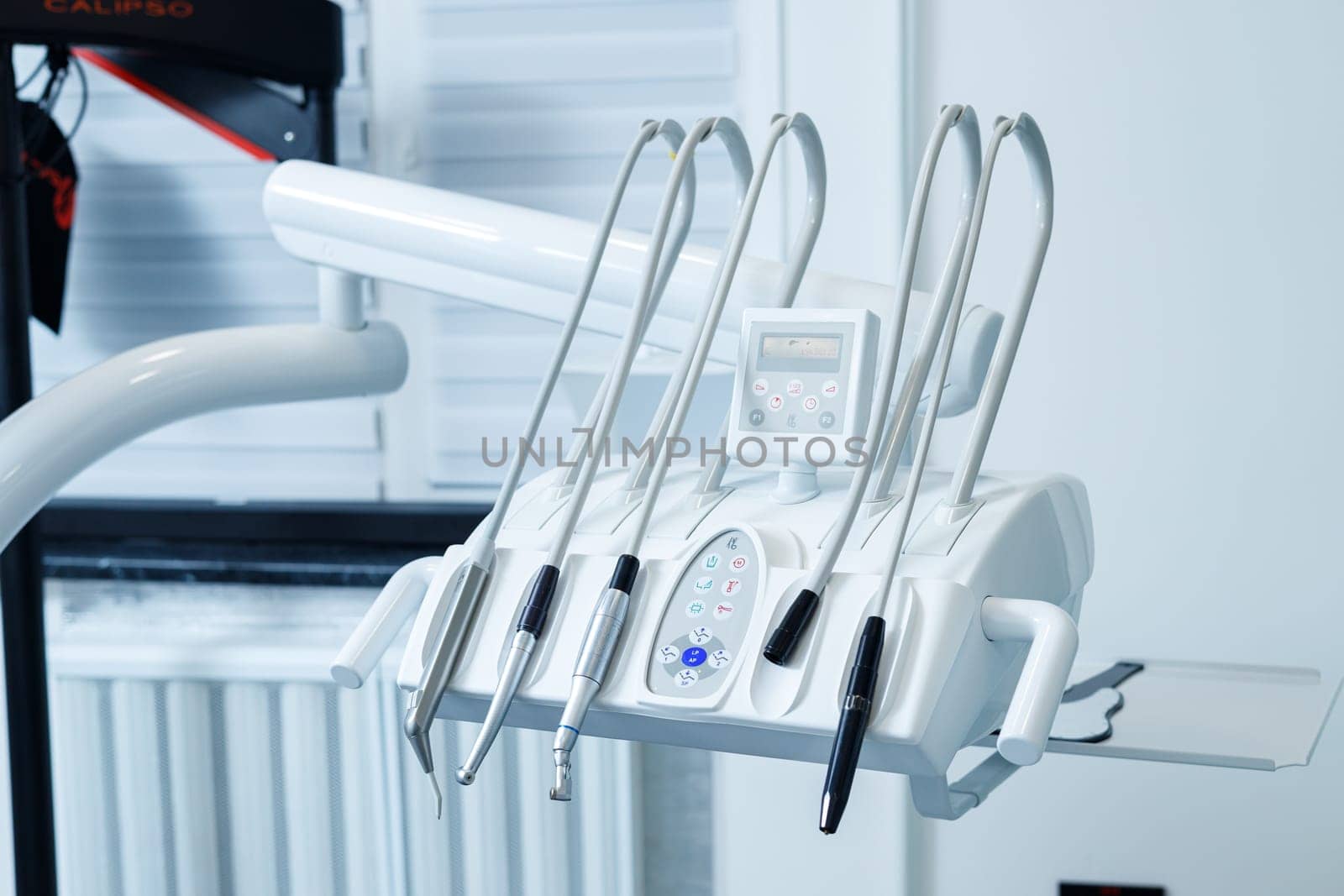 Close-up of dental chair tools. Dental Office