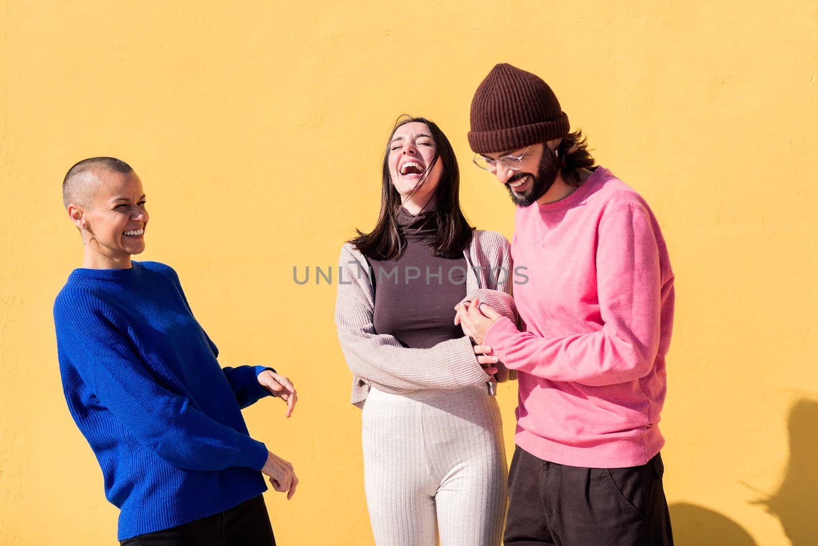 joyful young people having fun together by raulmelldo