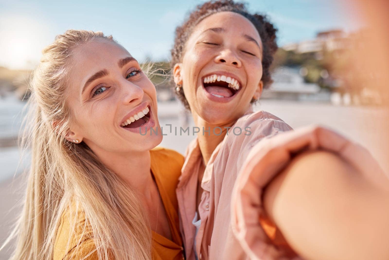 Women, beach and selfie portrait on summer, vacation or holiday with funny, crazy and happy smile. Travel, face and freedom by friends hug for photo, profile picture or social media post in Miami by YuriArcurs