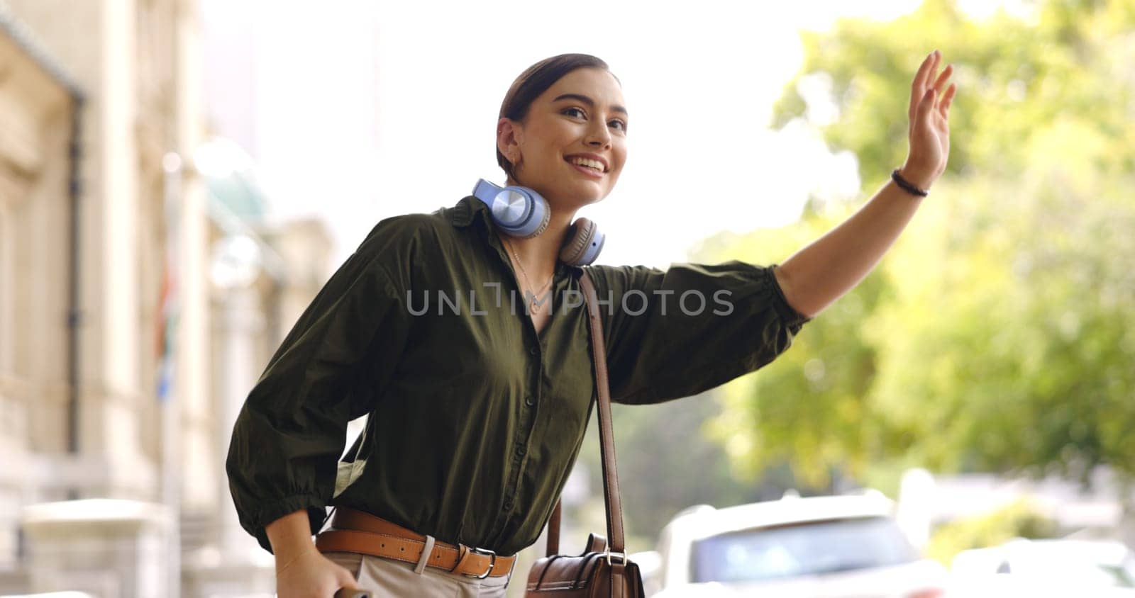 Happy, city and woman calling cab, taxi or public transport while exploring on adventure vacation. Travel, smile and young female person waving for transportation in town on holiday or weekend trip