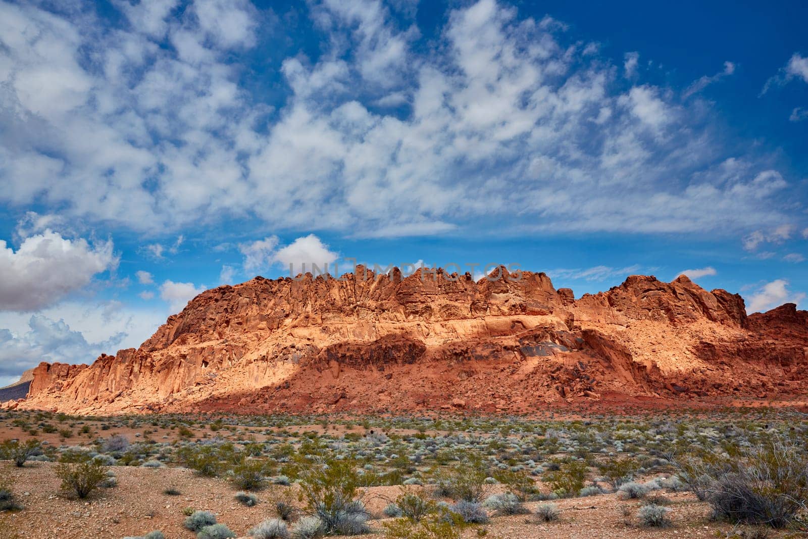 Valley of Fire is located 50 miles north of Las Vegas, Nevada.  Various shots depicting the rocky sandstone formations with some clouds and thunderstorms.